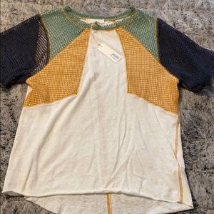 White tee shirt and shoulder/sleeve detailing